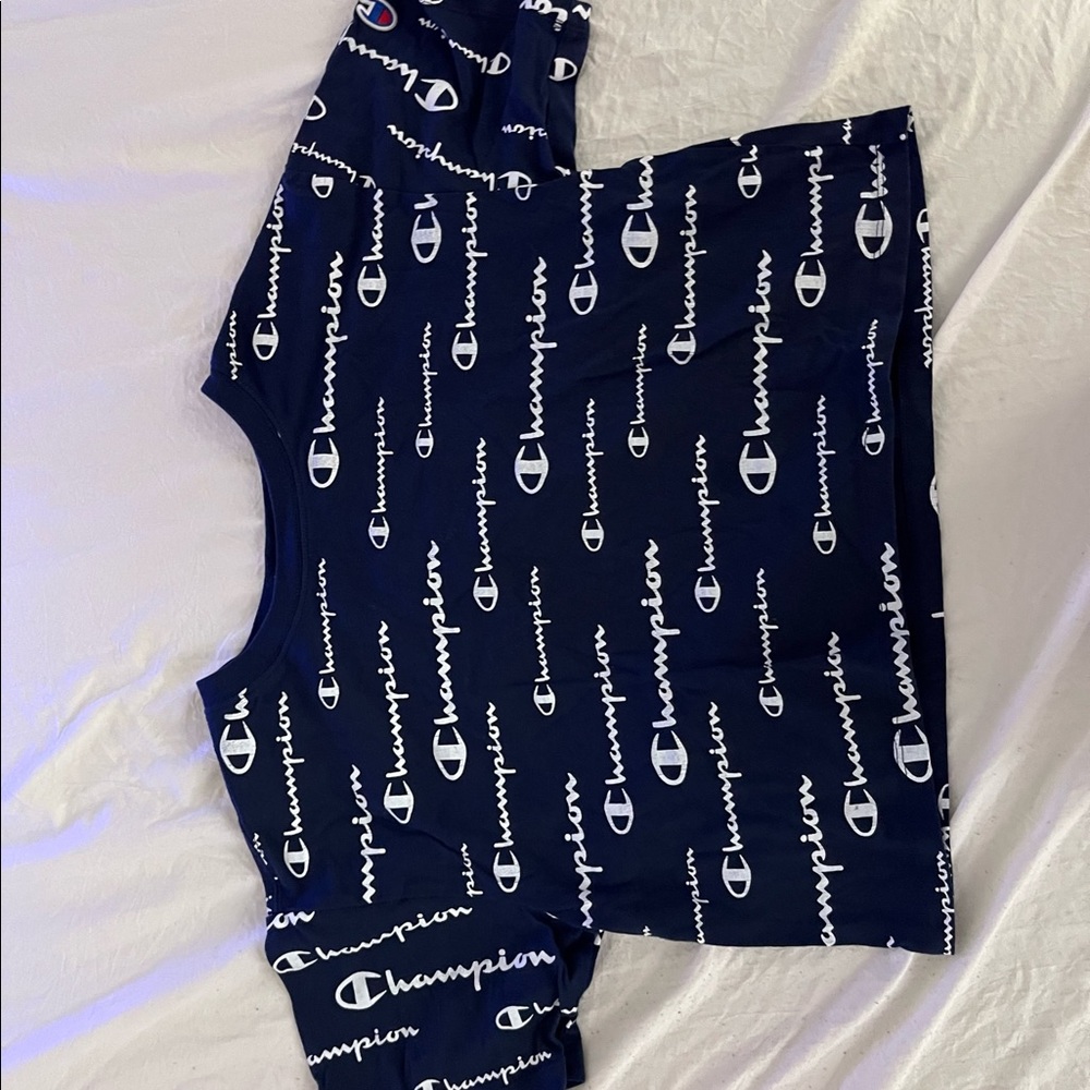 navy blue cropped champion logo girls t shirt